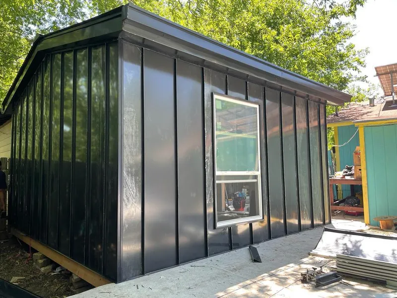 Black standing seam metal wall panels for Metal Roof Installation in Tifton